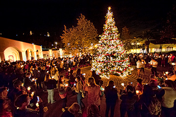 Pepperdine community gathers at night in Mullin Town for the annual Christmas tree lighting