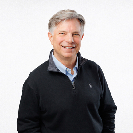 Headshot of Dr. Kent Rhodes in a dark sweater