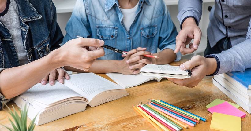 Group of people working at a desk