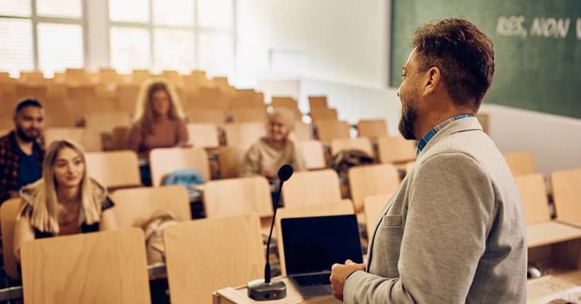 Teaching giving a lecture to his students