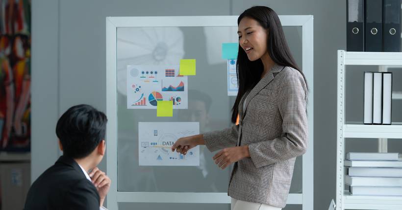 Person speaking with colleague