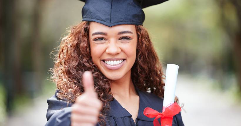 Graduate celebrating their accomplishment