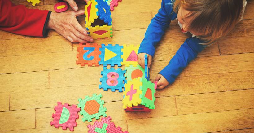 specialist autism playing with children and toys