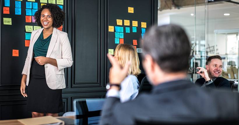 Person presenting during a company meeting