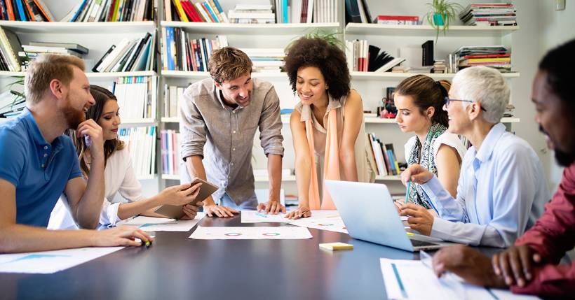 Group of people working together at a table