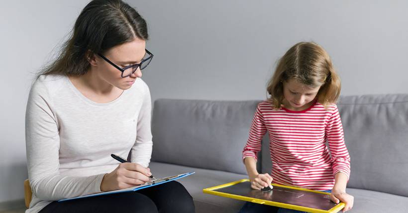 Behavioral Analyst working with young girl