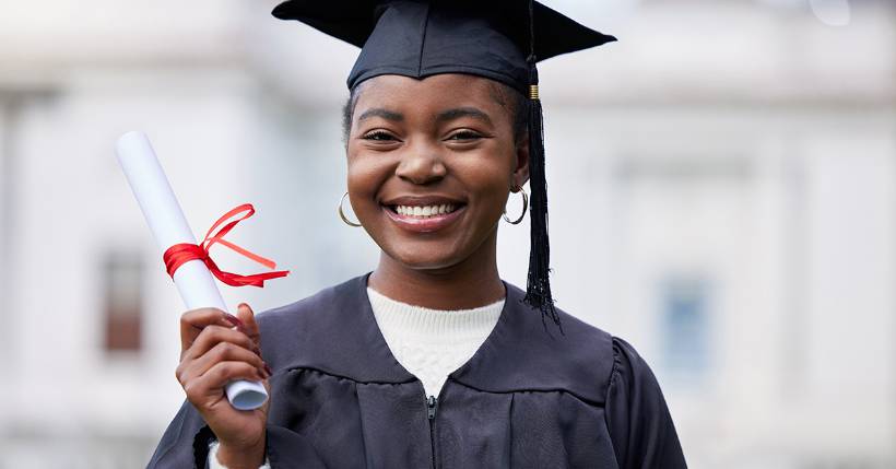 Woman holding diploma for specialist autism