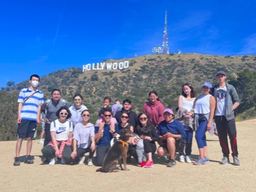 Group photo ahead of the Hollywood sign