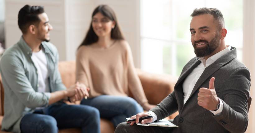 Therapist with two happy clients