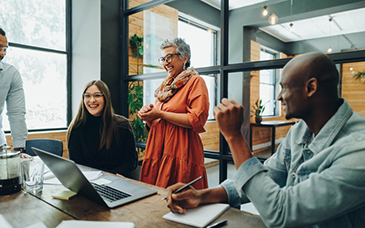 female leader working with her team 