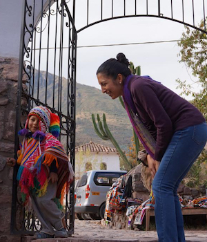 Dr. Celada-Dalton in Peru with local child