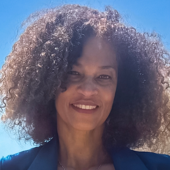 Headshot of Dana Pettaway in a blue suit