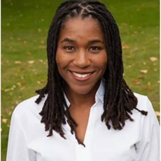 Dr. Tonya Woods smiling while posing outside