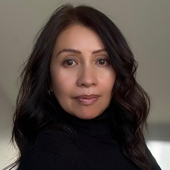 Headshot of Marissa Price in a black turtle neck sweater