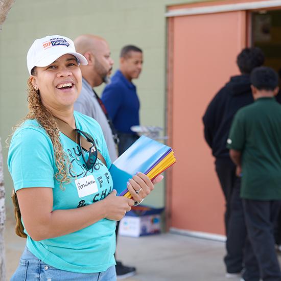 Female volunteer at Step Forward Day smiling